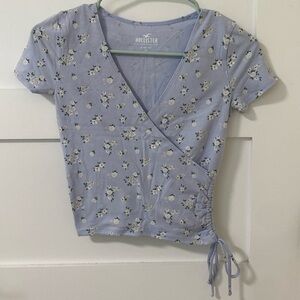 Hollister Light Blue Floral Wrap Crossover Top with waist tie. XS BNWT